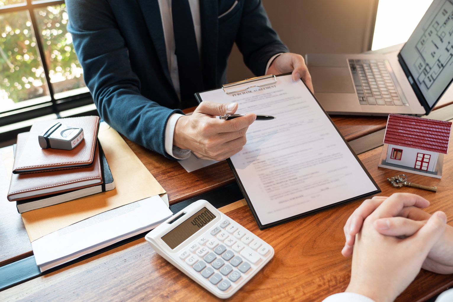 Real Estate Agent Presenting Home Loan